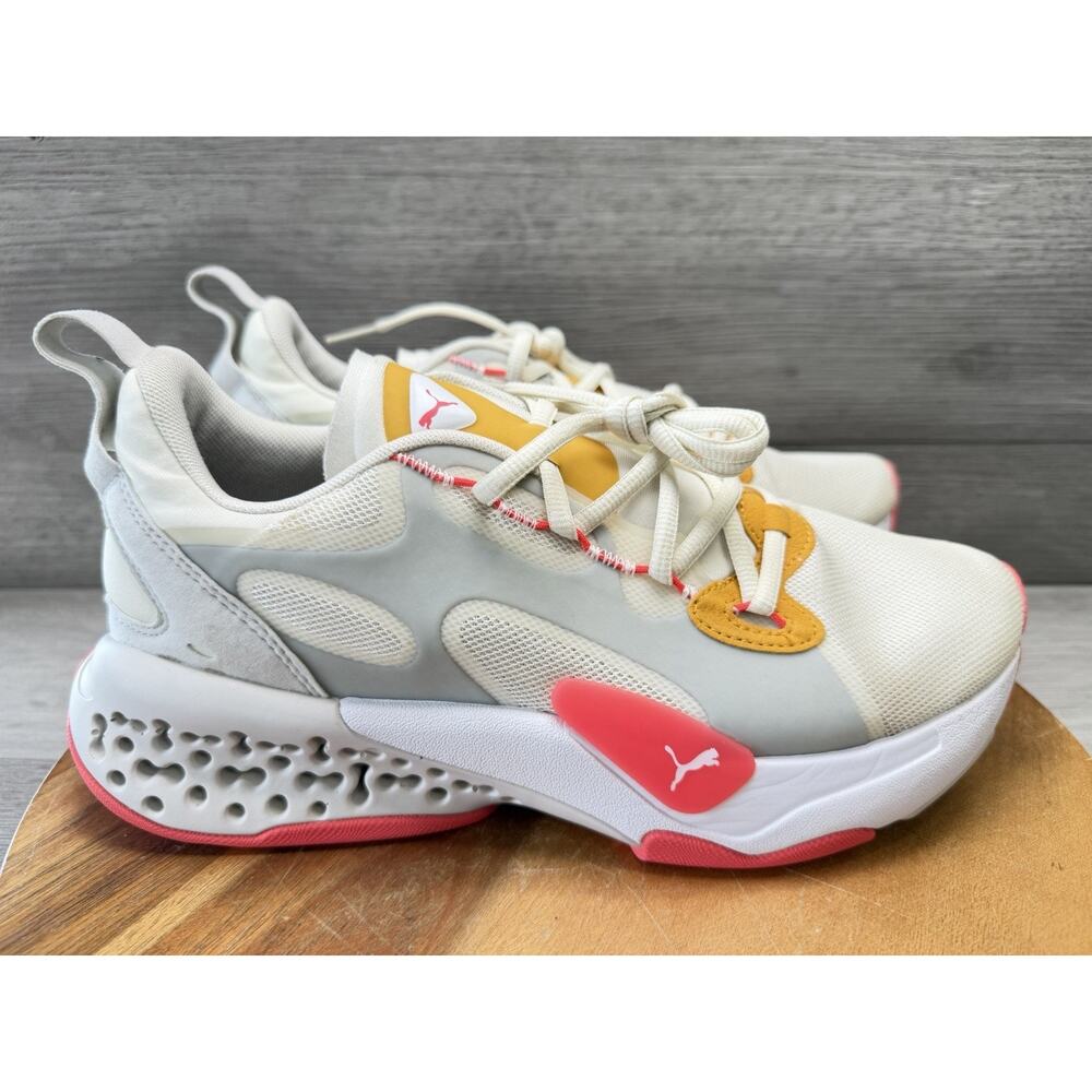 PUMA XETIC HALFLIFE ATHLETIC SHOES. WHITE AND PINK. WOMENS 10